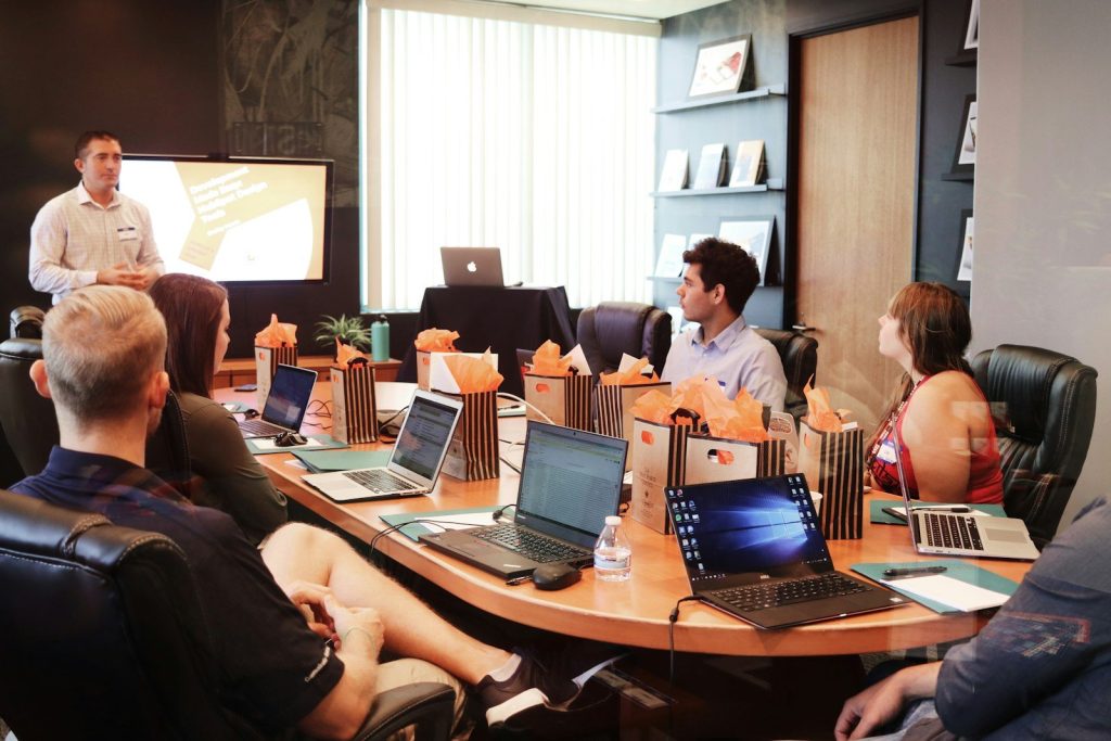 Growth marketing workshop with a team working on laptops